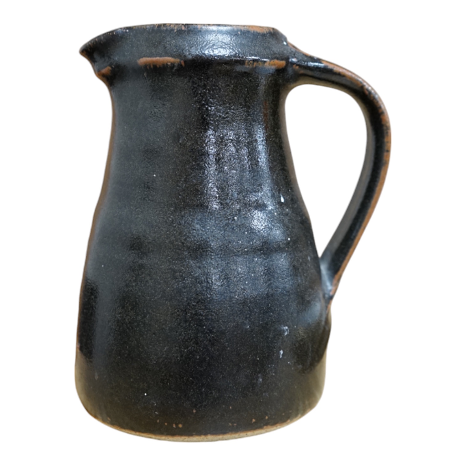 Leach standard ware, a small Stoneware black glazed studio pottery jug, impressed mark to top of foot rim, 15.5cm high. Condition - good